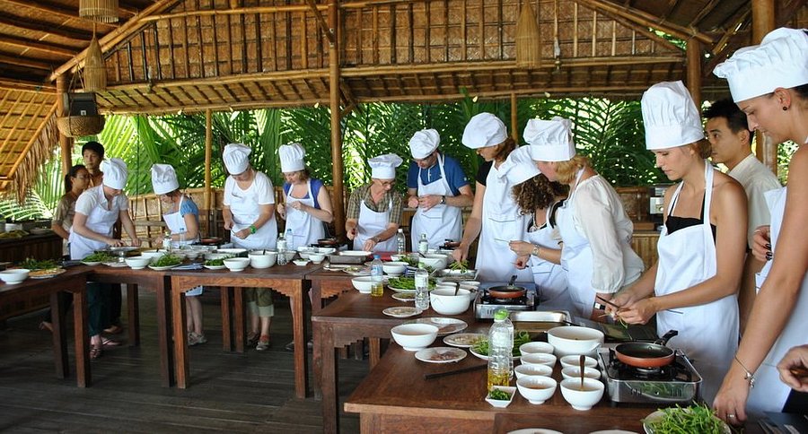 Master local recipes like cao lau in a beginner-friendly Hoi An cooking class with market tours.